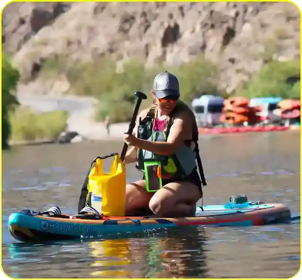 Guest paddleboarding on the calm waters of the Colorado River near Willow Beach