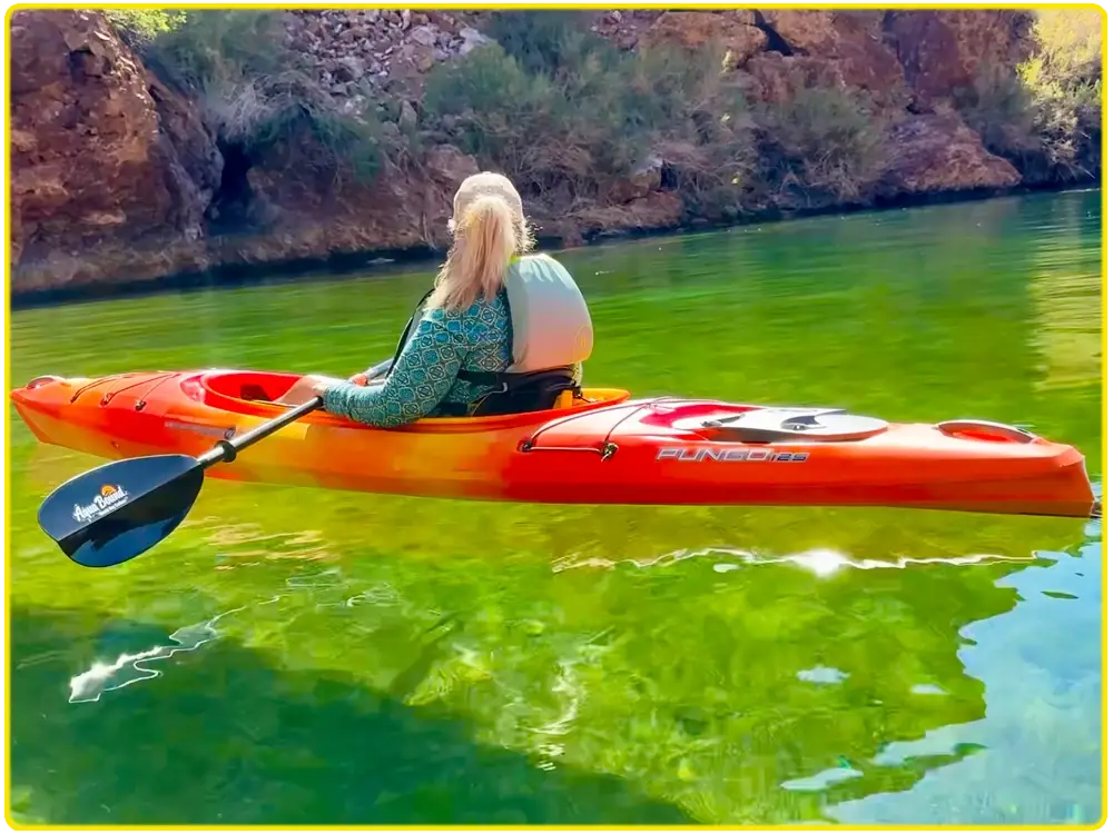 Kayaking through the Emerald Cave corridor