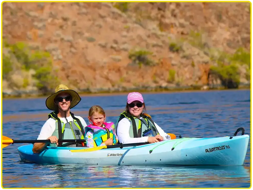 Family adventure group kayaking together
