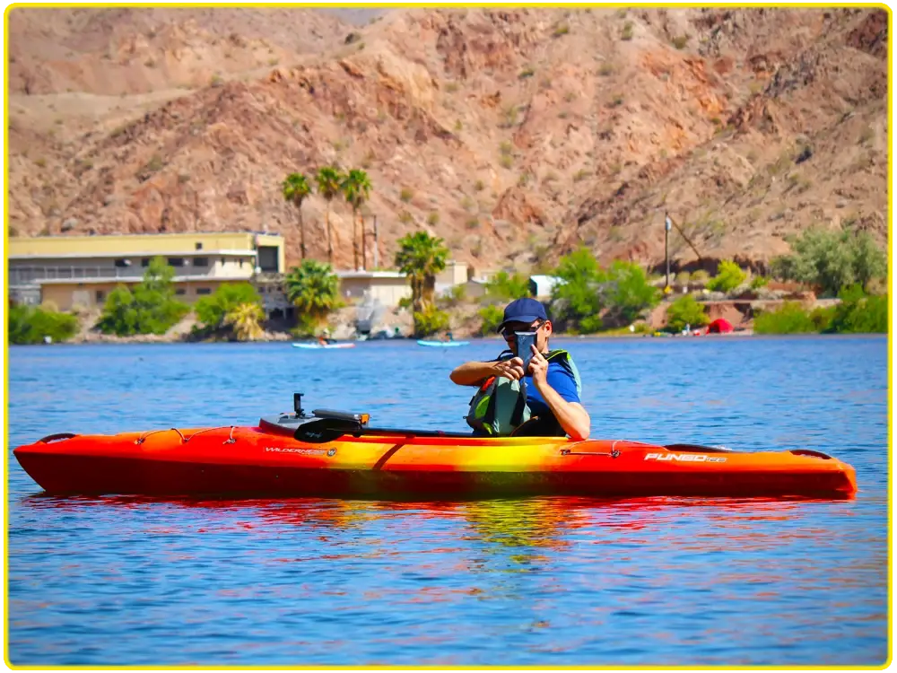 Photographing the kayaking scenery on the Colorado River