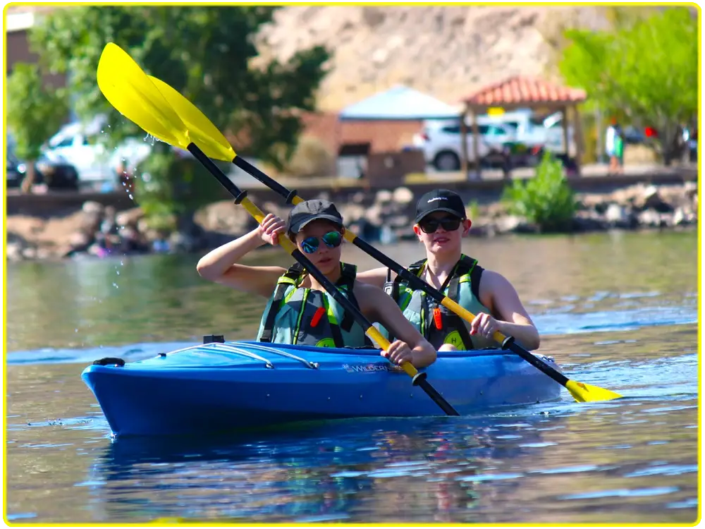Mother and daughter kayaking together